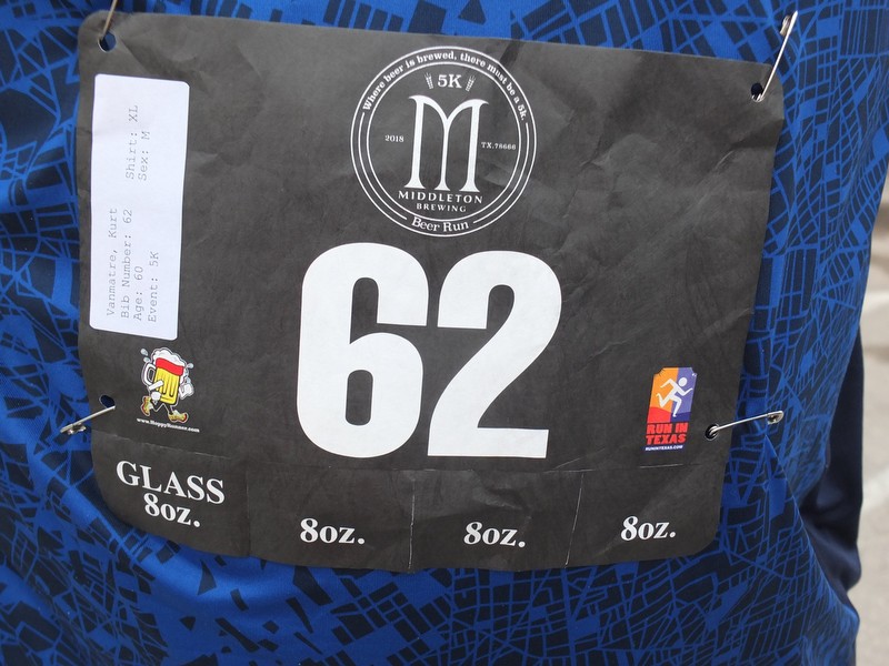 Bib number tag includes tear off coupons