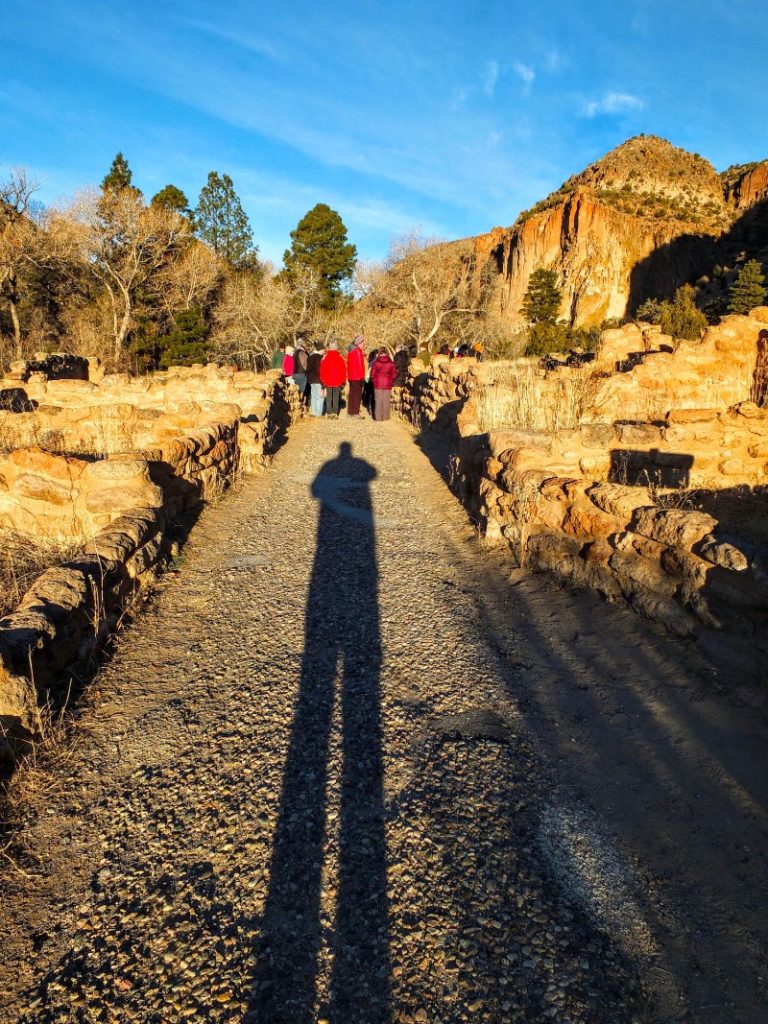 shadow aligns with ancient walkway