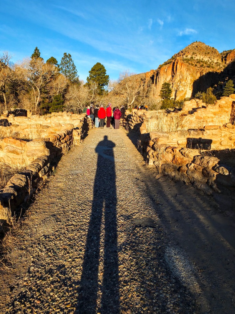 shadow aligns with ancient walkway
