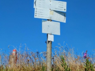 weather beaten trail sign weather beaten trail sign
