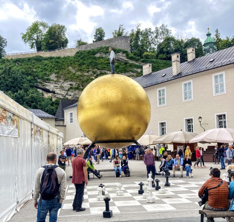 Sphaera - everyman atop a golden ball